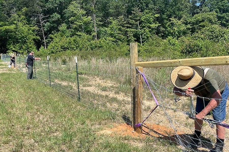 the simplest way to fence a hobby farm without heavy machinery