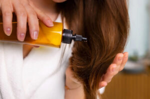 how to use hair growth oil spray for maximum results